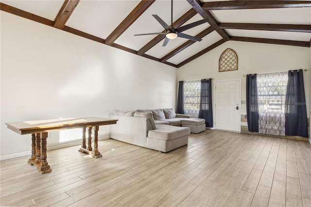 1240 W Voorhis Ave, Deland, FL 32720 - unfurnished living room with high vaulted ceiling, beamed ceiling, ceiling fan, and light wood finished floors