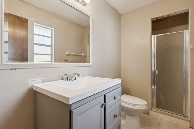 1240 W Voorhis Ave, Deland, FL 32720 - full bath featuring toilet, a stall shower, tile patterned floors, and vanity