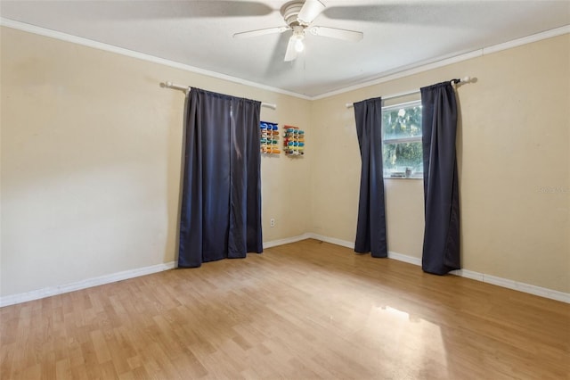 1240 W Voorhis Ave, Deland, FL 32720 - unfurnished room with ornamental molding, a ceiling fan, wood finished floors, and baseboards
