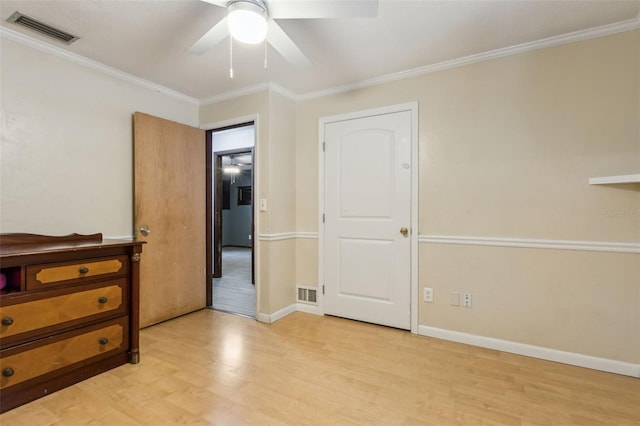 1240 W Voorhis Ave, Deland, FL 32720 - unfurnished bedroom with ornamental molding, visible vents, and light wood finished floors