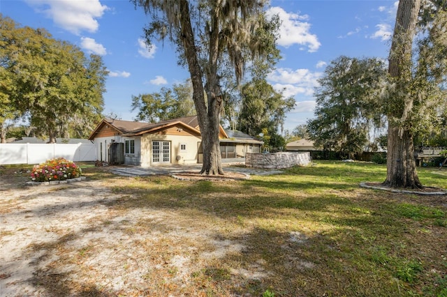 1240 W Voorhis Ave, Deland, FL 32720 - view of yard featuring fence and french doors