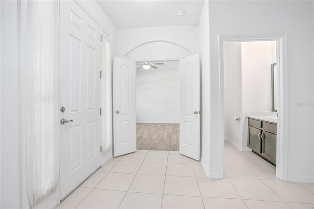 hall with light tile patterned flooring