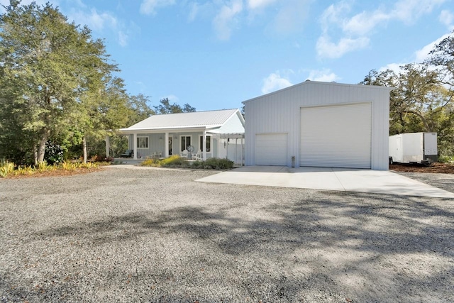 view of front of home featuring a garage and covered porch