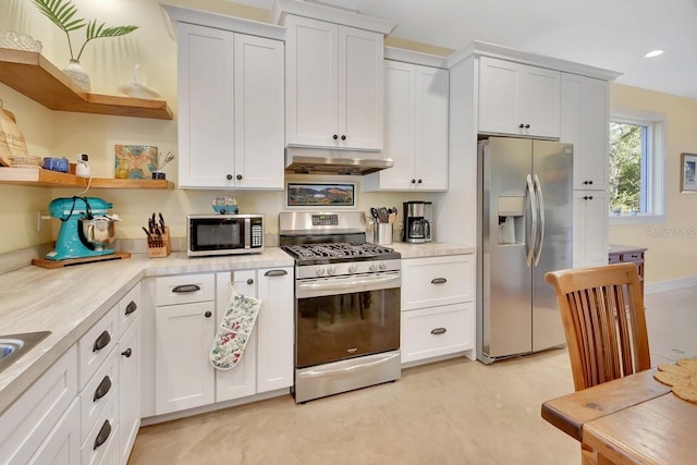 kitchen with white cabinetry and appliances with stainless steel finishes