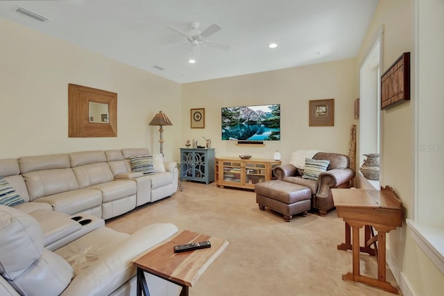 living room featuring carpet flooring and ceiling fan