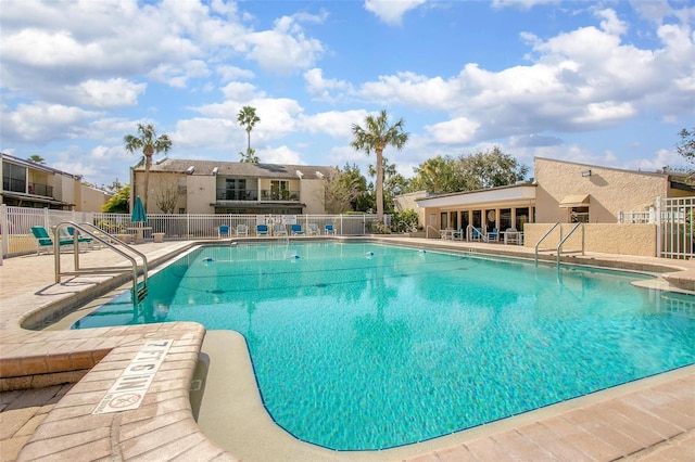 view of pool featuring a patio