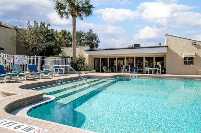 view of pool featuring a patio