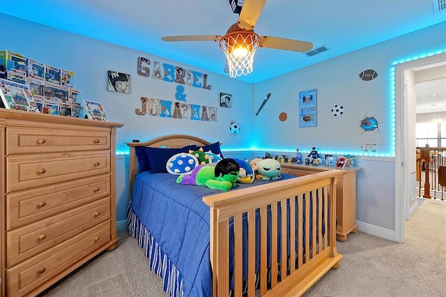 carpeted bedroom with ceiling fan