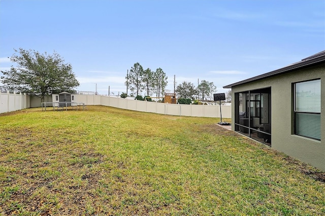 view of yard featuring a trampoline