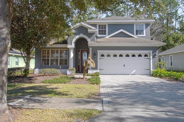 view of front of property featuring a garage