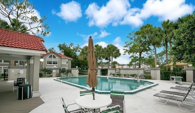 view of swimming pool featuring a patio