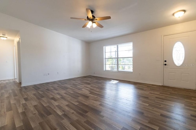 entryway with dark wood-type flooring and ceiling fan