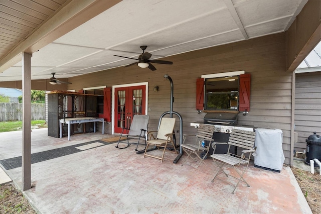 view of patio / terrace featuring french doors, ceiling fan, and area for grilling