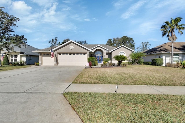 428 Hightower Dr, Debary, FL 32713 - ranch-style house featuring driveway, an attached garage, a front lawn, and stucco siding