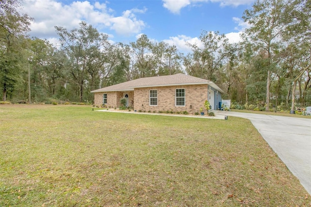 ranch-style home with a front lawn