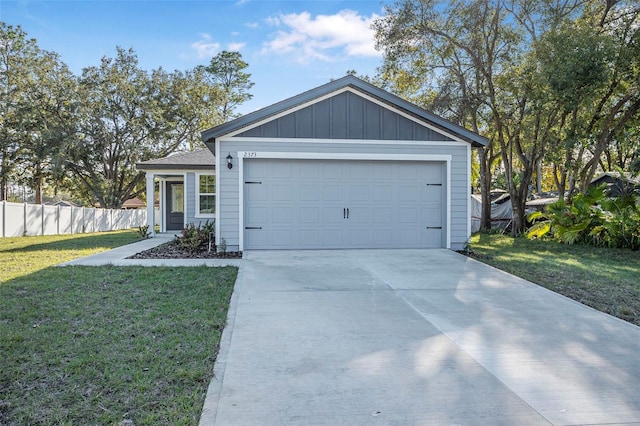 ranch-style home featuring a garage and a front lawn