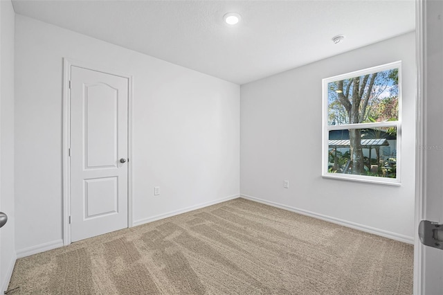 view of carpeted spare room