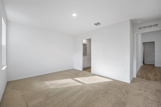 empty room with carpet floors