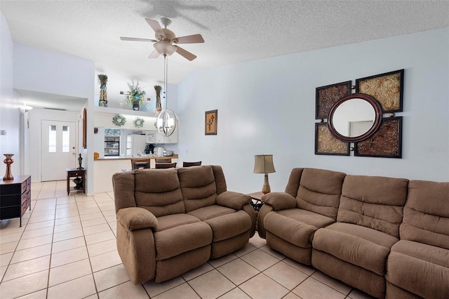 245 Terrace Hill Blvd Unit 1E, Debary, FL 32713 - living room featuring light tile patterned floors, a ceiling fan, and a textured ceiling