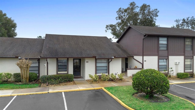 245 Terrace Hill Blvd Unit 1E, Debary, FL 32713 - view of building exterior featuring uncovered parking
