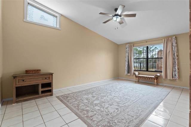 interior space with vaulted ceiling and ceiling fan