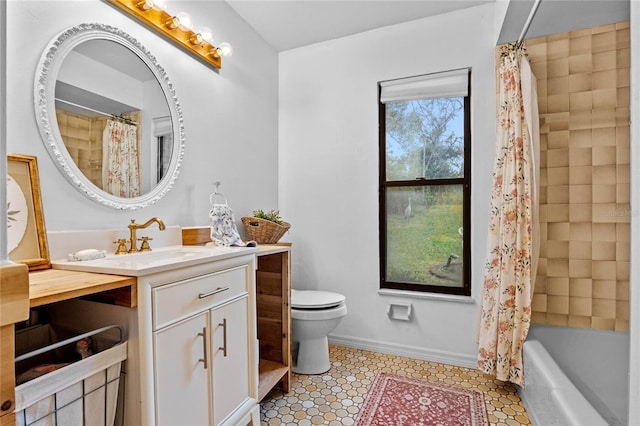 full bathroom with vanity, toilet, and shower / bath combo