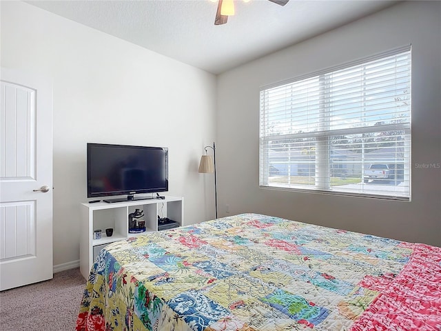 bedroom featuring carpet and ceiling fan