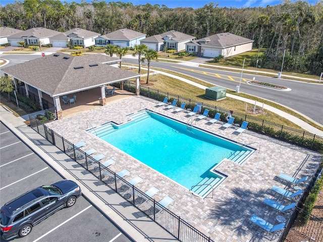 view of swimming pool with a patio area