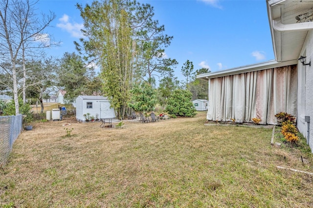 view of yard with a shed