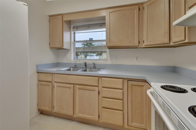 kitchen with white electric range, sink, and light brown cabinets