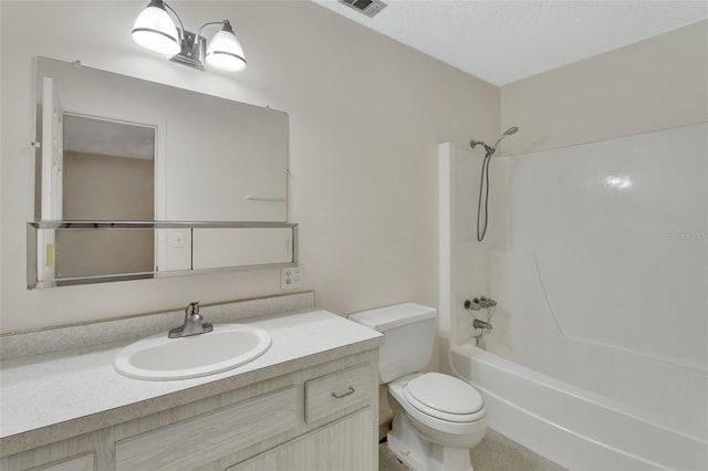 full bathroom featuring vanity, toilet, and washtub / shower combination