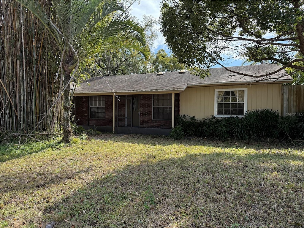 view of front of home with a front yard