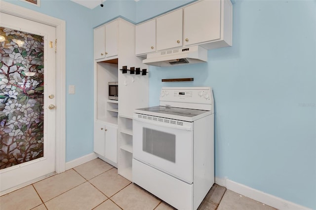 kitchen featuring white cabinetry, white electric range, stainless steel microwave, and light tile patterned floors