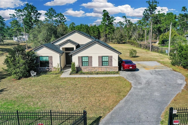 view of front of house with a front lawn