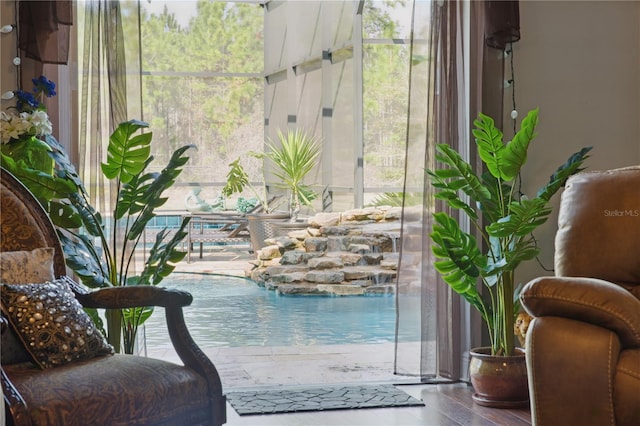 view of swimming pool featuring pool water feature