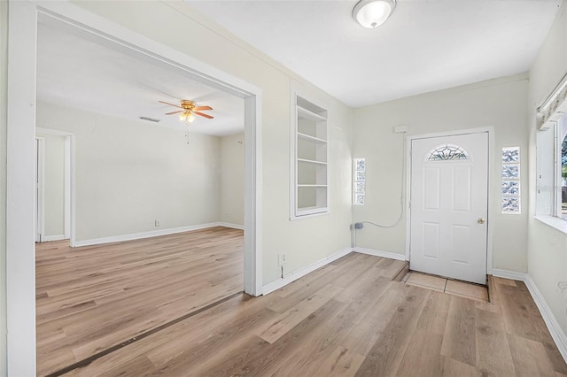 foyer featuring light hardwood / wood-style flooring and ceiling fan