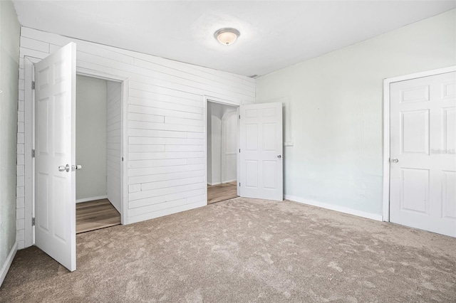 unfurnished bedroom with carpet