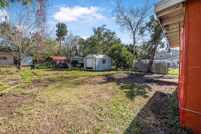 view of yard with a storage shed