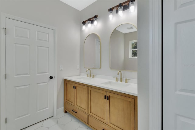 bathroom featuring vanity and tile patterned flooring