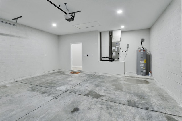 garage with heating unit, a garage door opener, and water heater