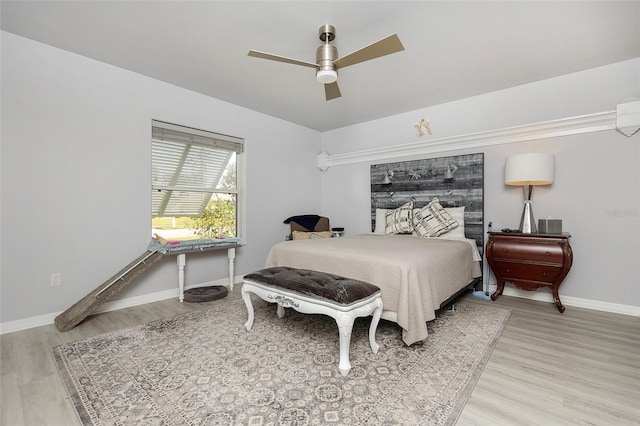 bedroom featuring ceiling fan and light wood-type flooring