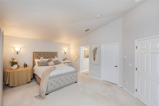 bedroom featuring lofted ceiling, light carpet, visible vents, and baseboards