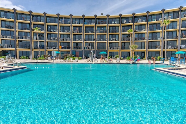 pool with a patio area