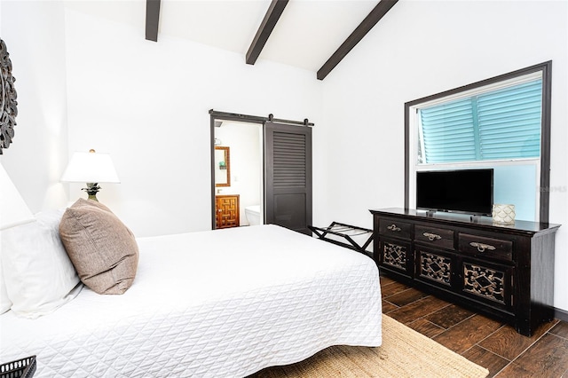 bedroom with dark hardwood / wood-style flooring, lofted ceiling with beams, and a barn door