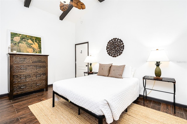 bedroom featuring ceiling fan and a towering ceiling