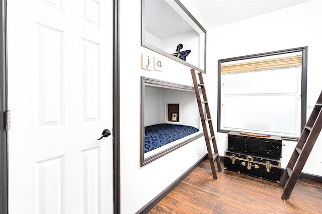 bedroom featuring hardwood / wood-style flooring