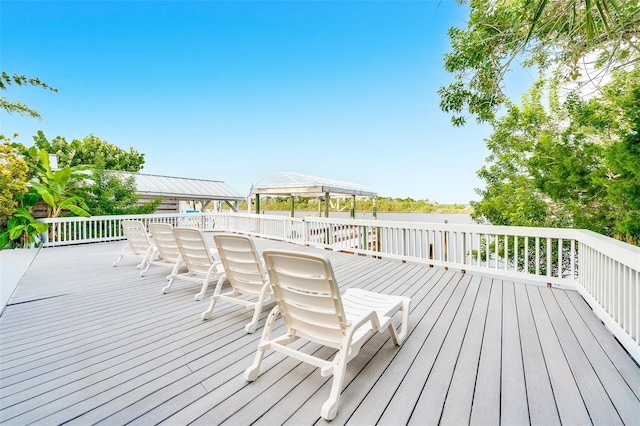 wooden deck featuring a gazebo