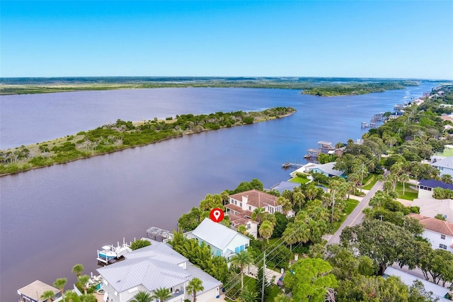 birds eye view of property featuring a water view