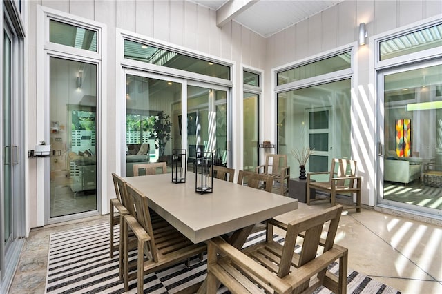 sunroom with beam ceiling