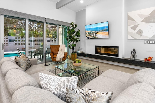 living room with beam ceiling